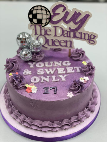 Mauve cake with dancing queen topper